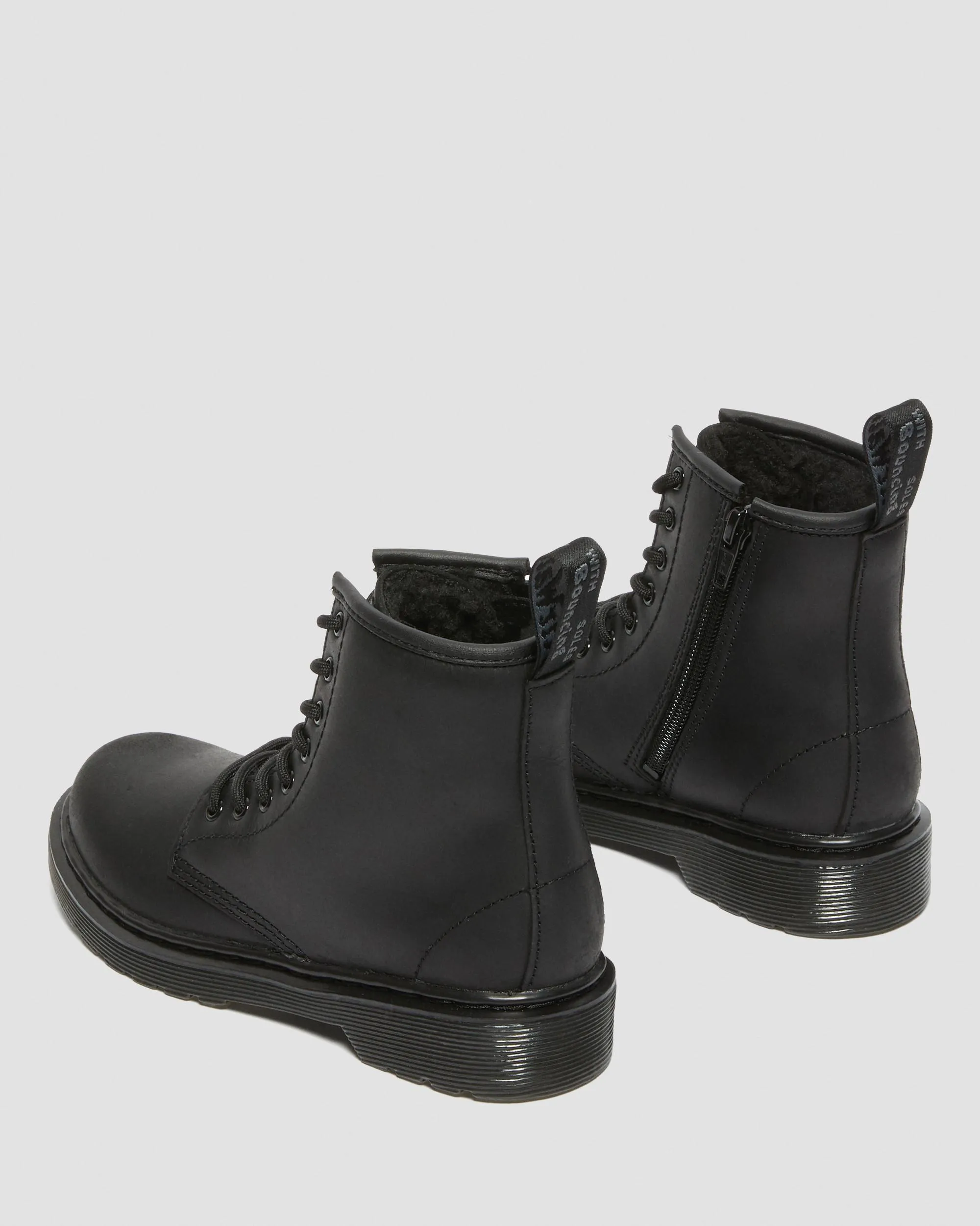 Junior 1460 boots lined with faux fur Dr. Martens